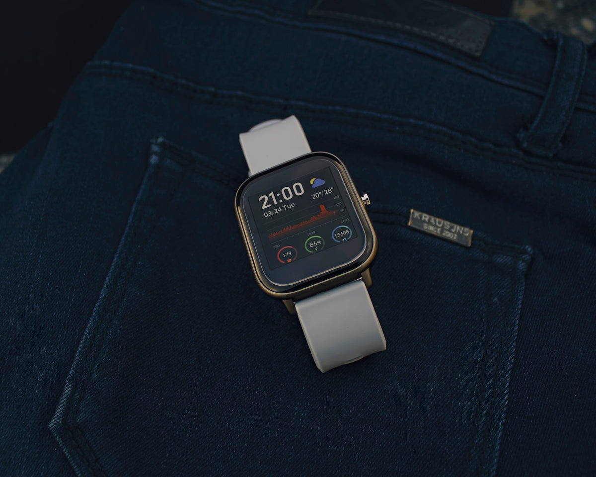 white sports band apple watch
